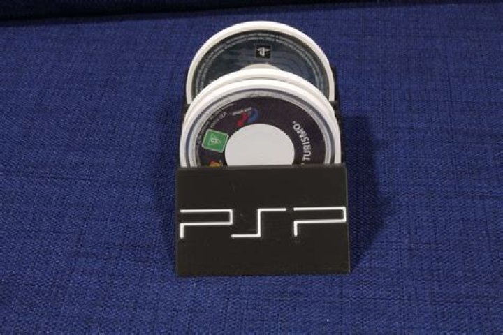 What are the dimensions for the PSP UMD's game case?